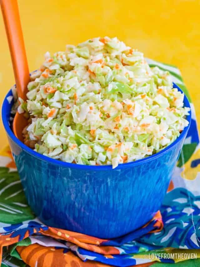 Bowl of KFC Coleslaw Recipe in a blue bowl with a yellow background