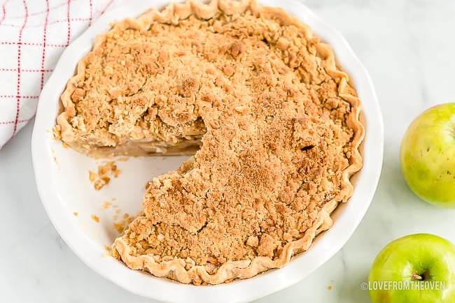 Apple Crumb Pie with one slice cut out