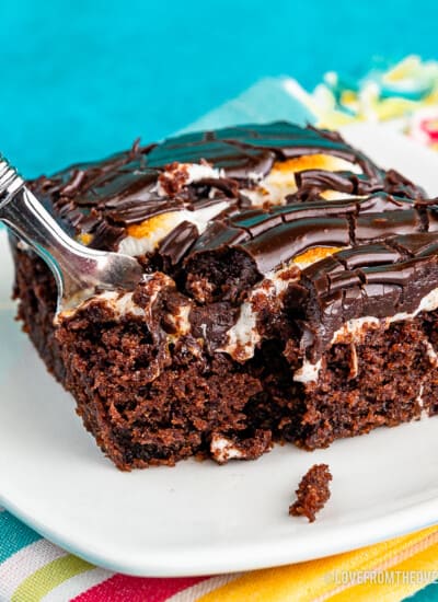 Slice of Mississippi Mud Cake with a fork taking a piece