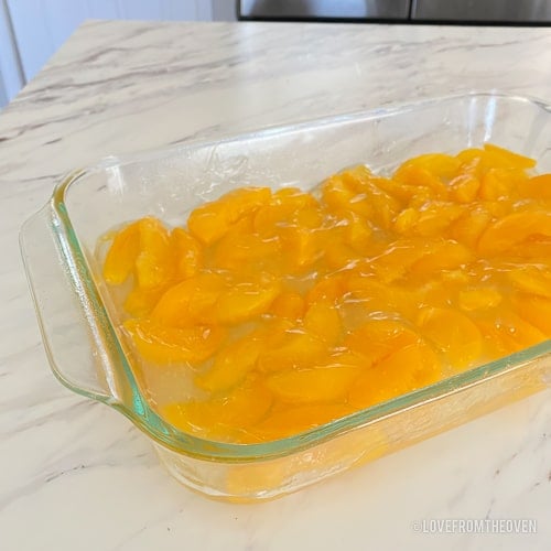 peaches in a baking dish