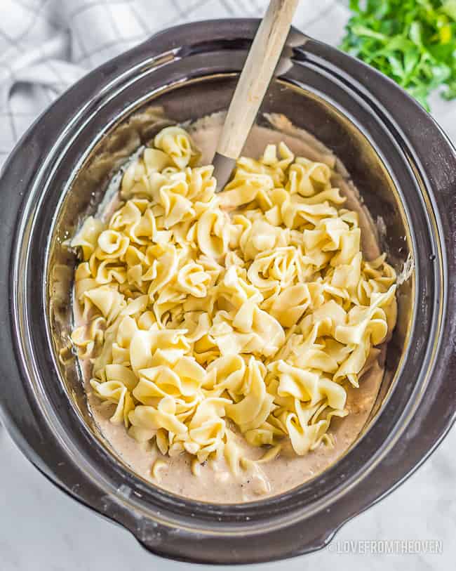 Egg noodles in beef stroganoff in a crock pot