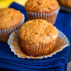 Banana Bread muffins on a blue napkin.