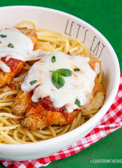 Chicken parmesan in a bowl with pasta