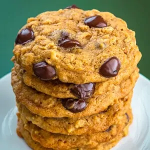 a stack of pumpkin chocolate chip cookies