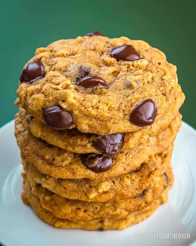 a stack of pumpkin chocolate chip cookies