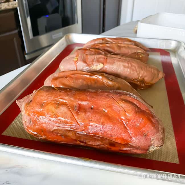 Baked sweet potatoes on a pan