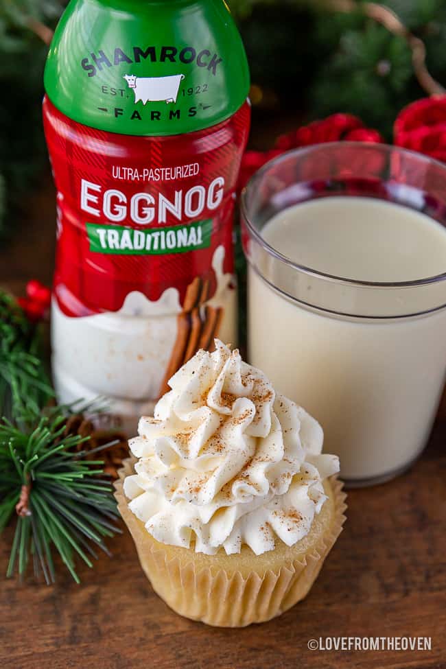 Shamrock Farms Eggnog with an eggnog cupcake and glass of eggnog