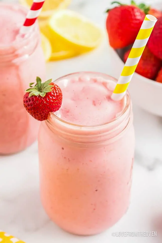 Frozen Strawberry Smoothie with yellow straw