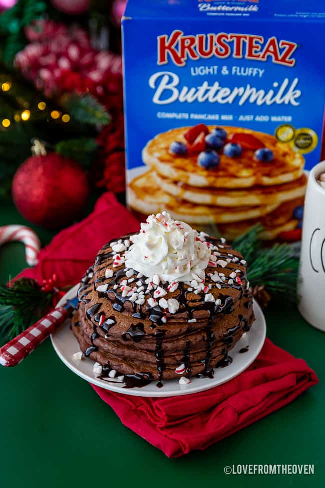 Chocolate pancakes with a box of Krusteaz pancake mix