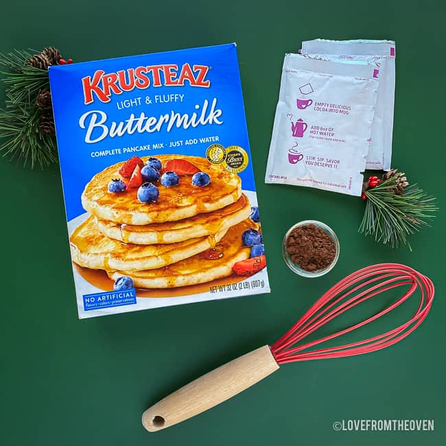 ingredients for pancakes on a green background