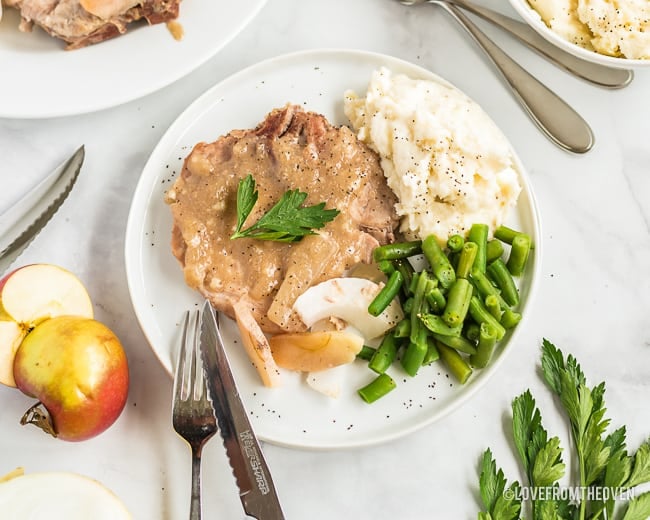 Ranch pork chops on a white plate