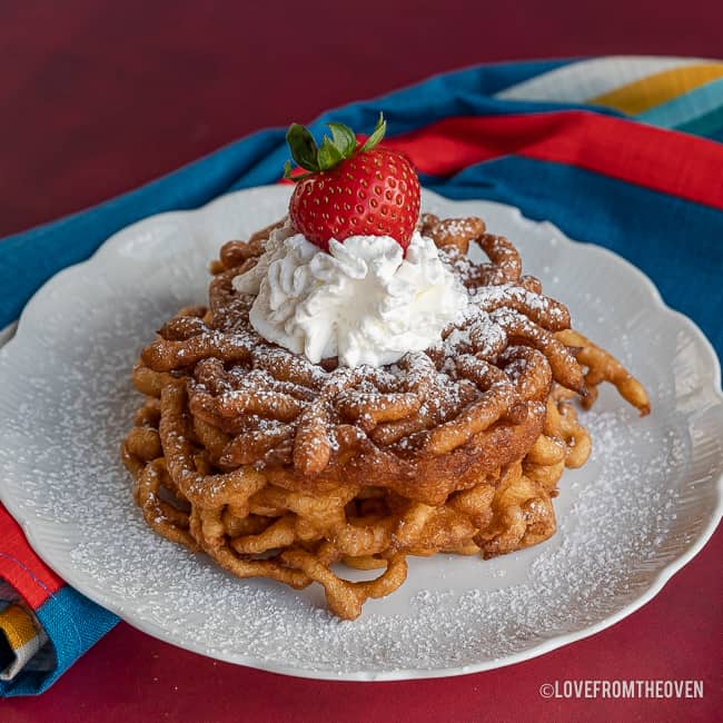 Funnel cake on a white plate