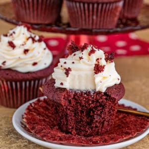 red velvet cupcake with a bite taken out of it