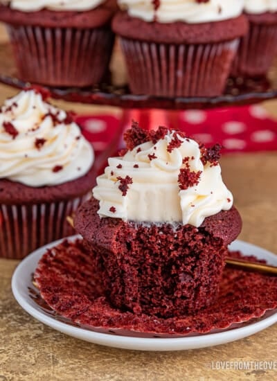 red velvet cupcake with a bite taken out of it