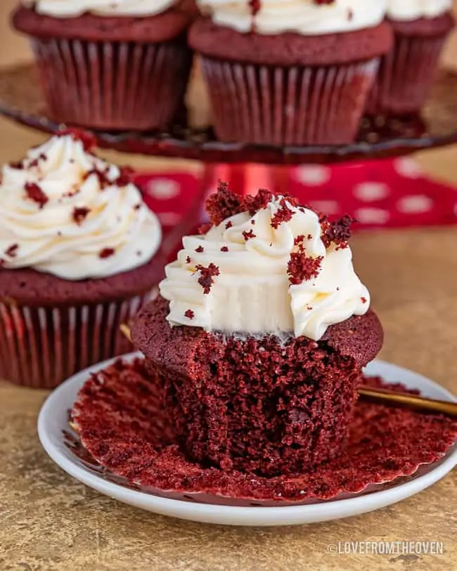 red velvet cupcake with a bite taken out of it