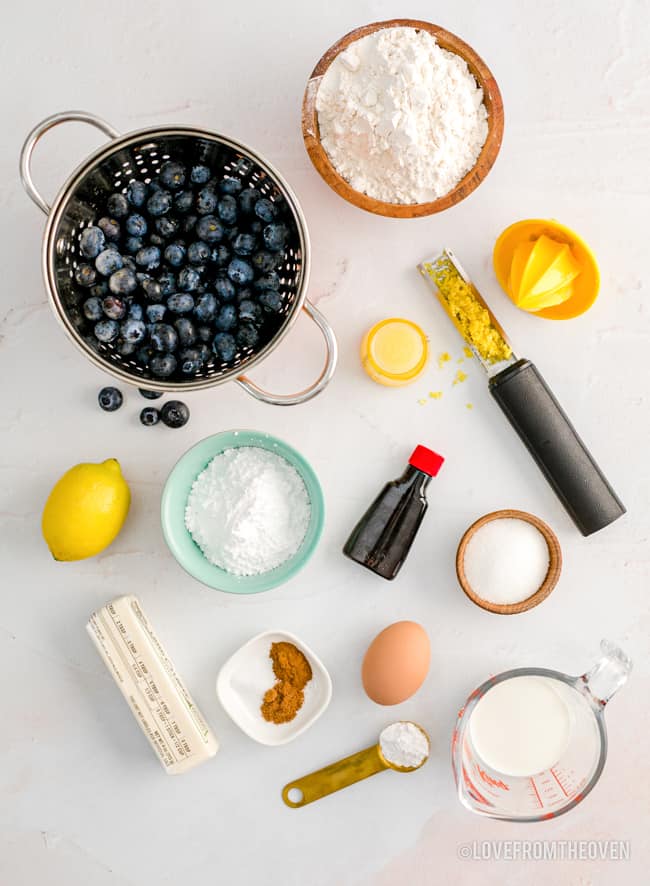 ingredients for lemon blueberry scones on a white background