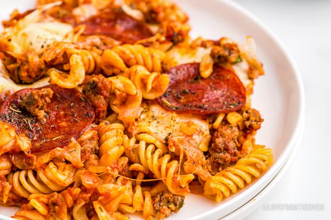 Close up shot of a plate of pizza pasta 