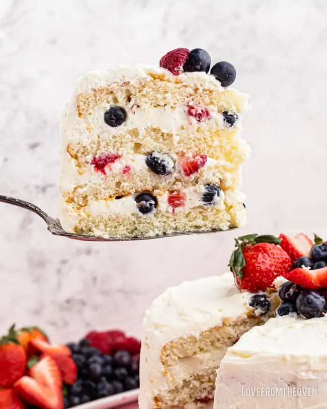 A slice of chantilly cake on a spatula