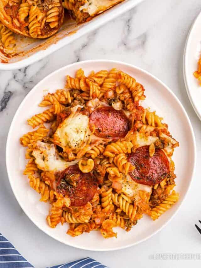 An overhead shot of a plate of pizza pasta