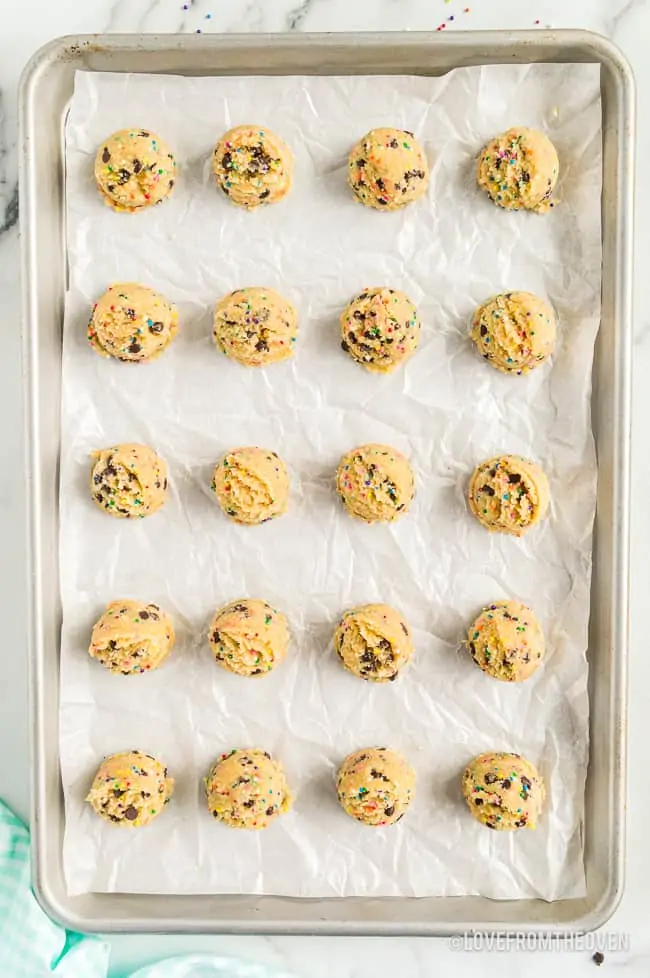 a sheet full of cookie dough bites