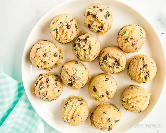 A plate full of edible cookie dough bites
