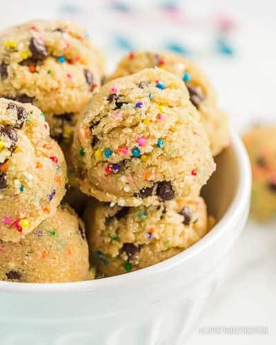 A close up of a bowl of cookie dough bites