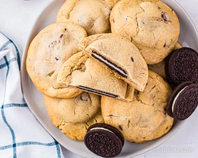 A plate of chocolate chip cookies stuffed with Oreos
