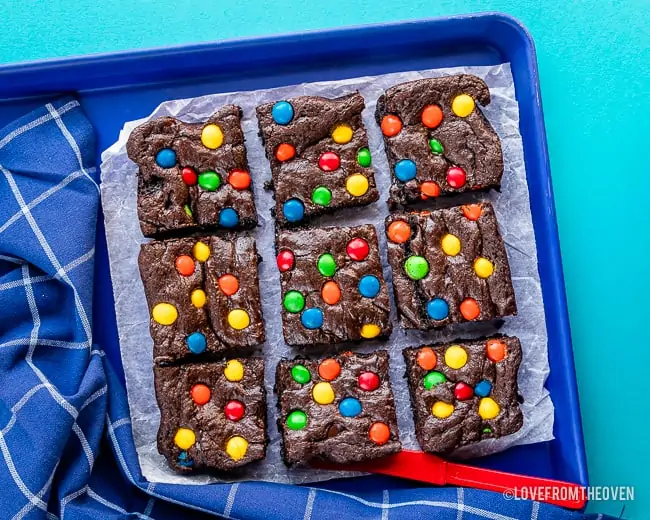 9 M&M Brownies on a blue background