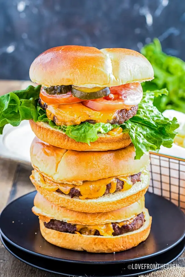 a stack of hamburgers and cheeseburgers made in an air fryer