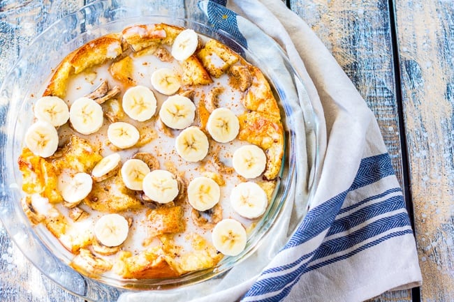 a dish of banana bread pudding on a blue background