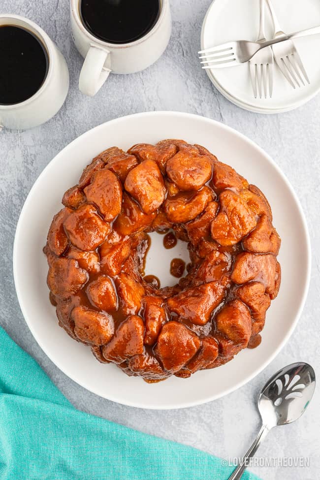 A bundt cake of monkey bread on a white plate