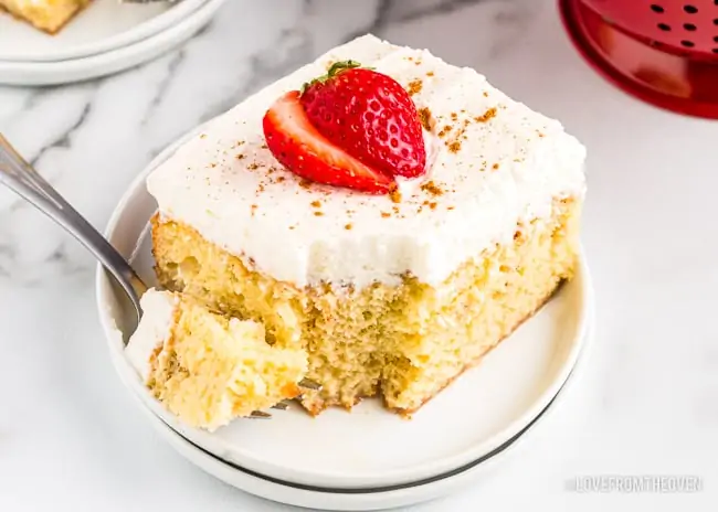 A slice of tres leches cake