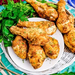 a plate of air fryer chicken drumsticks