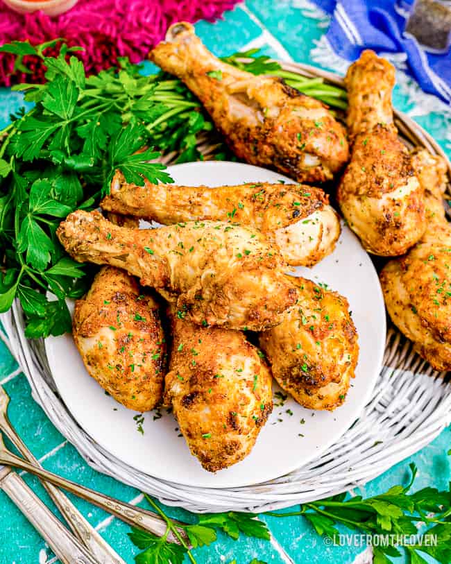 a plate of air fryer chicken drumsticks