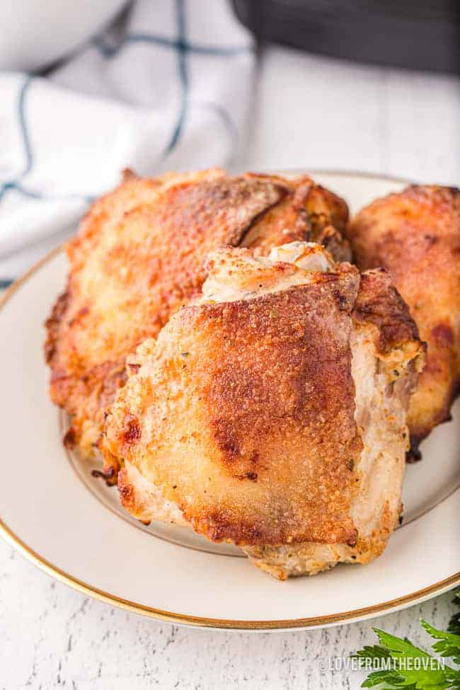 a plate of air fryer chicken thighs