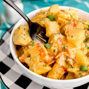 A bowl of cheesy potatoes made in an instant pot