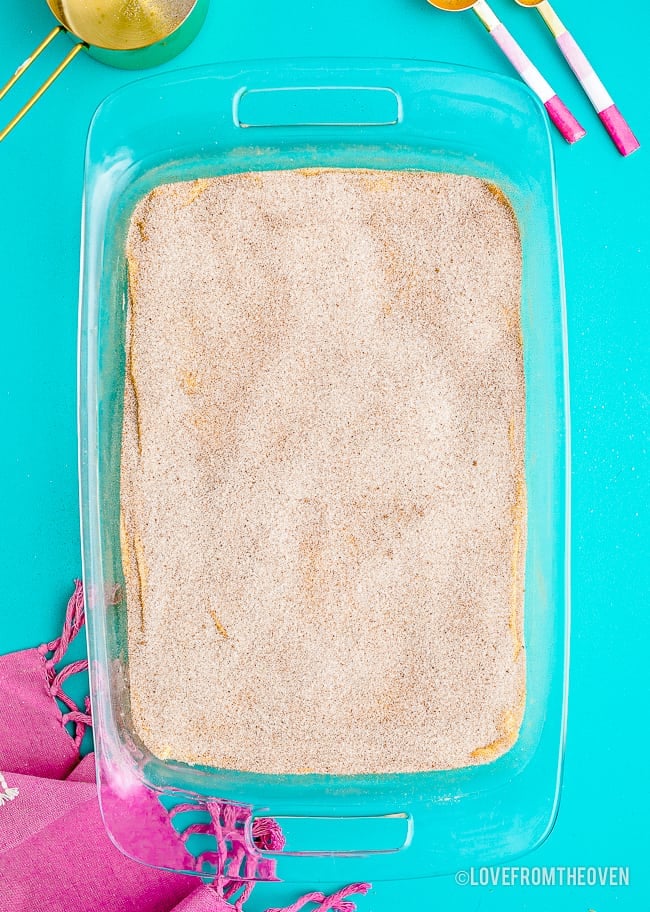 A pan of churro cheesecake bars