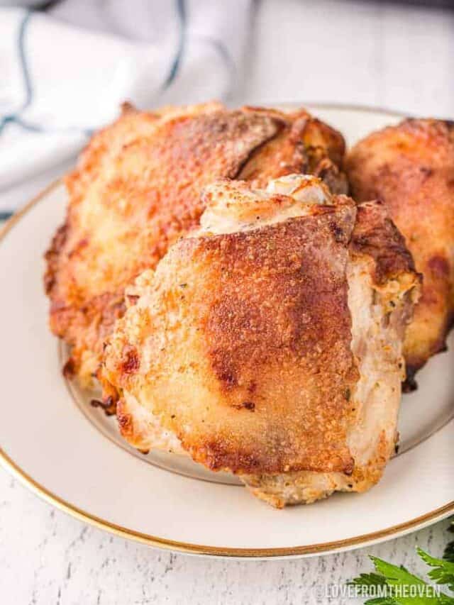 a plate of air fryer chicken thighs