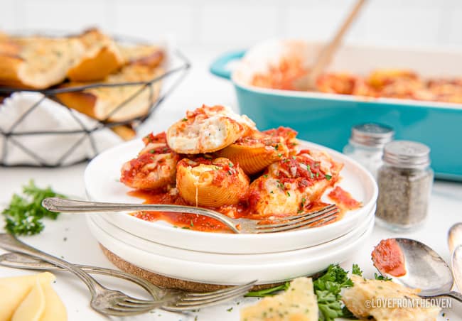 A plate of shells in red sauce