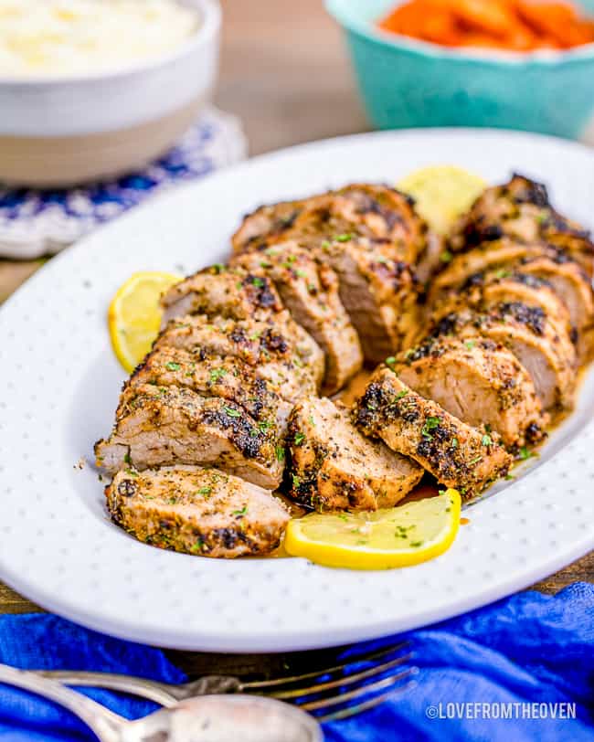 a platter of pork tenderloin