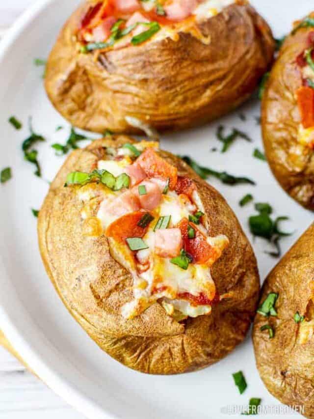 A plate of air fryer baked potatoes with toppings