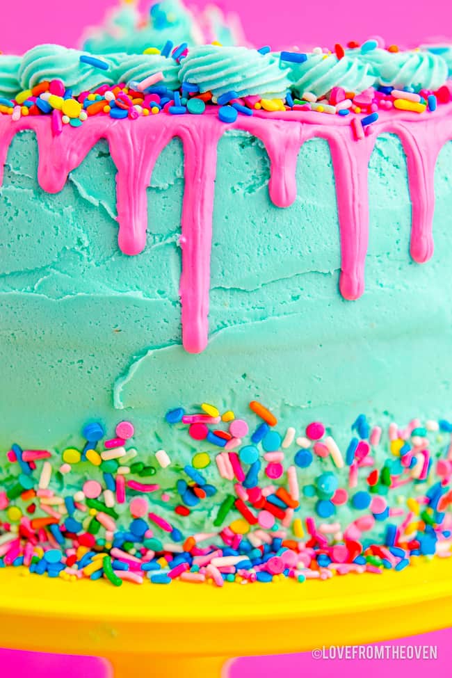 close up of a cake with frosting made with powdered sugar