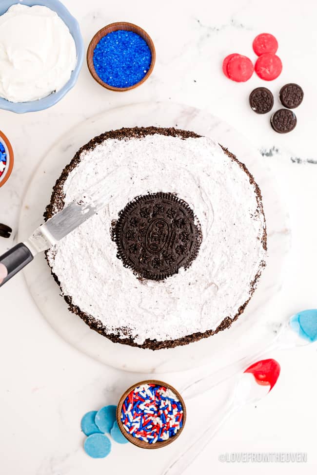 decorating an ice cream cake