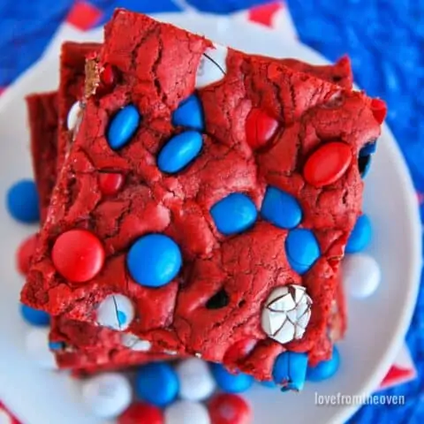 A stack of red white and blue cookie bars.