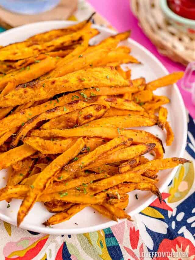 A plate full of sweet potato fries.