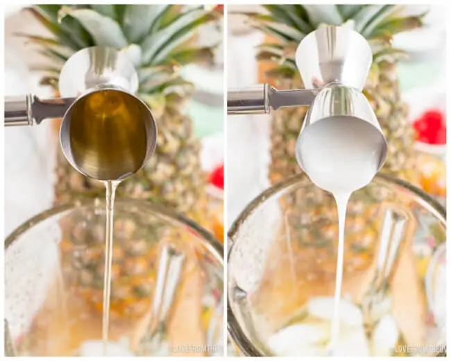 Ingredients being poured into a blender to make a pina colada.
