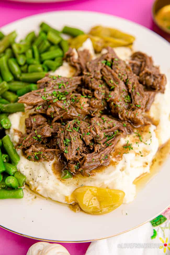 a plate of mississippi pot roast and mashed potatoes 