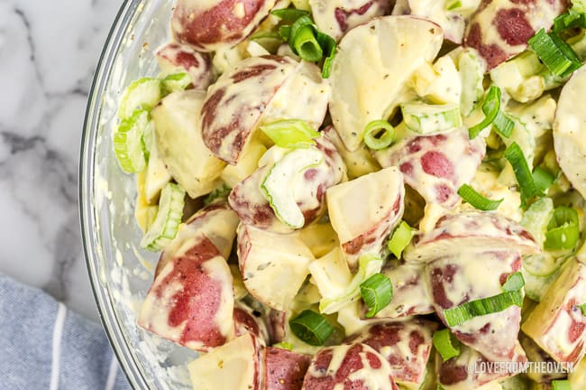 A bowl of red potato salad.