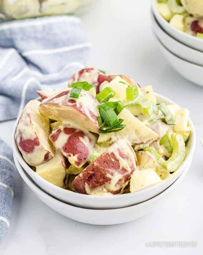 Old Fashioned Potato Salad in a white bowl.