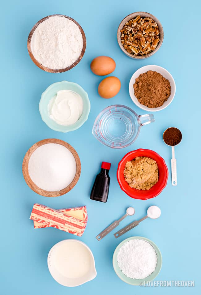 Ingredients for Texas sheet cake on a blue background.